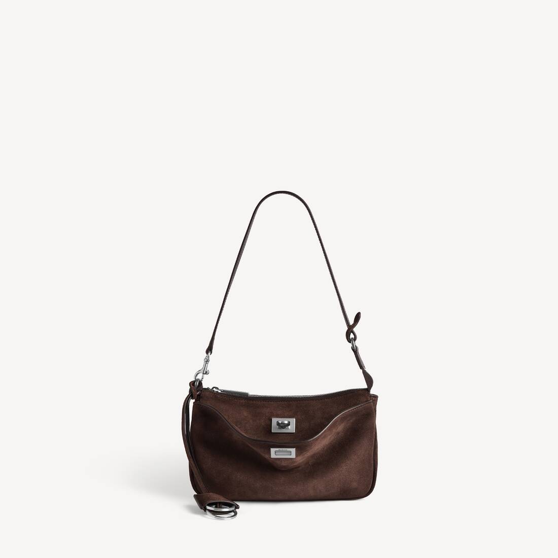 Kvinnas rodeo-slingpochette i kaffebrun