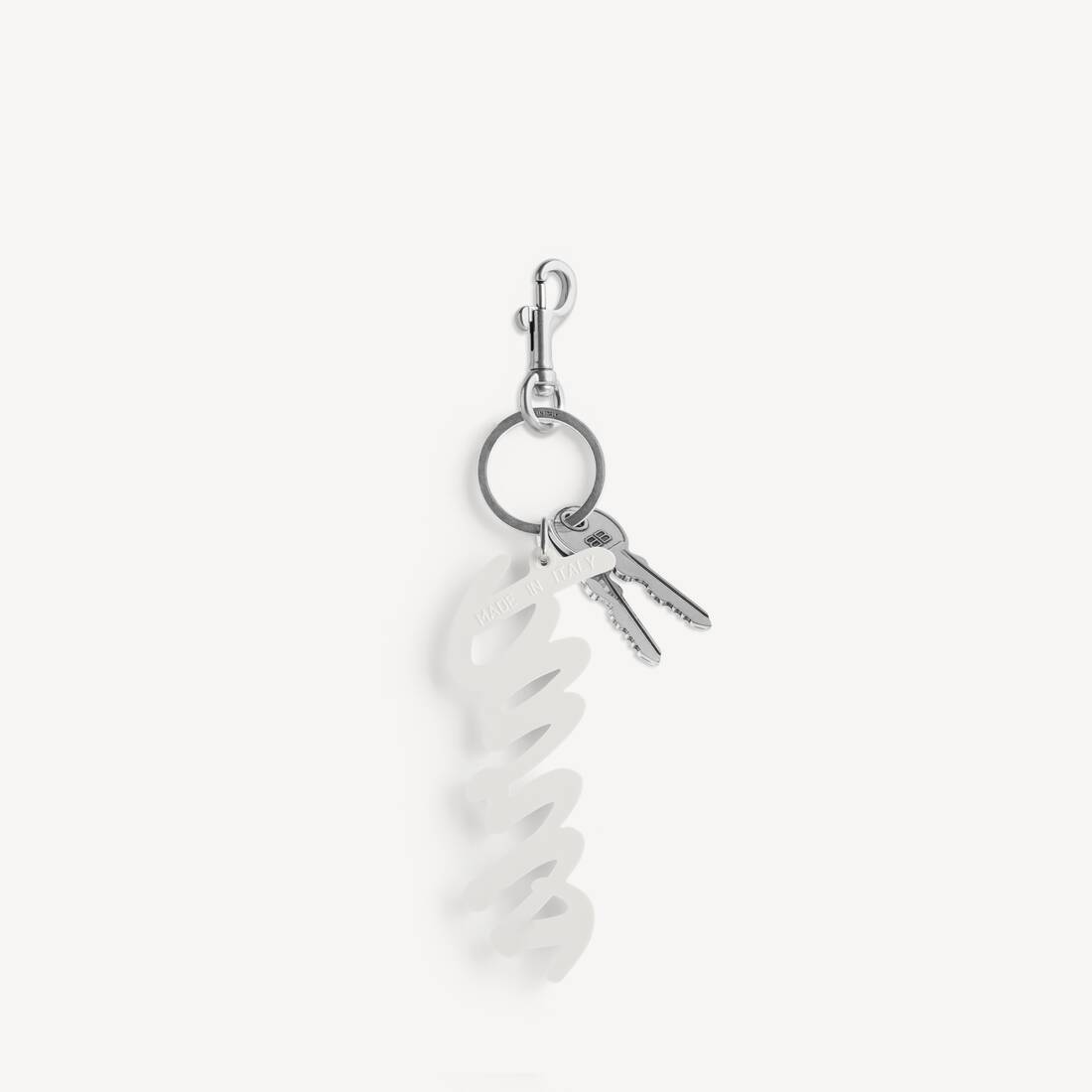 Charm/nötklocka Paris i vitt