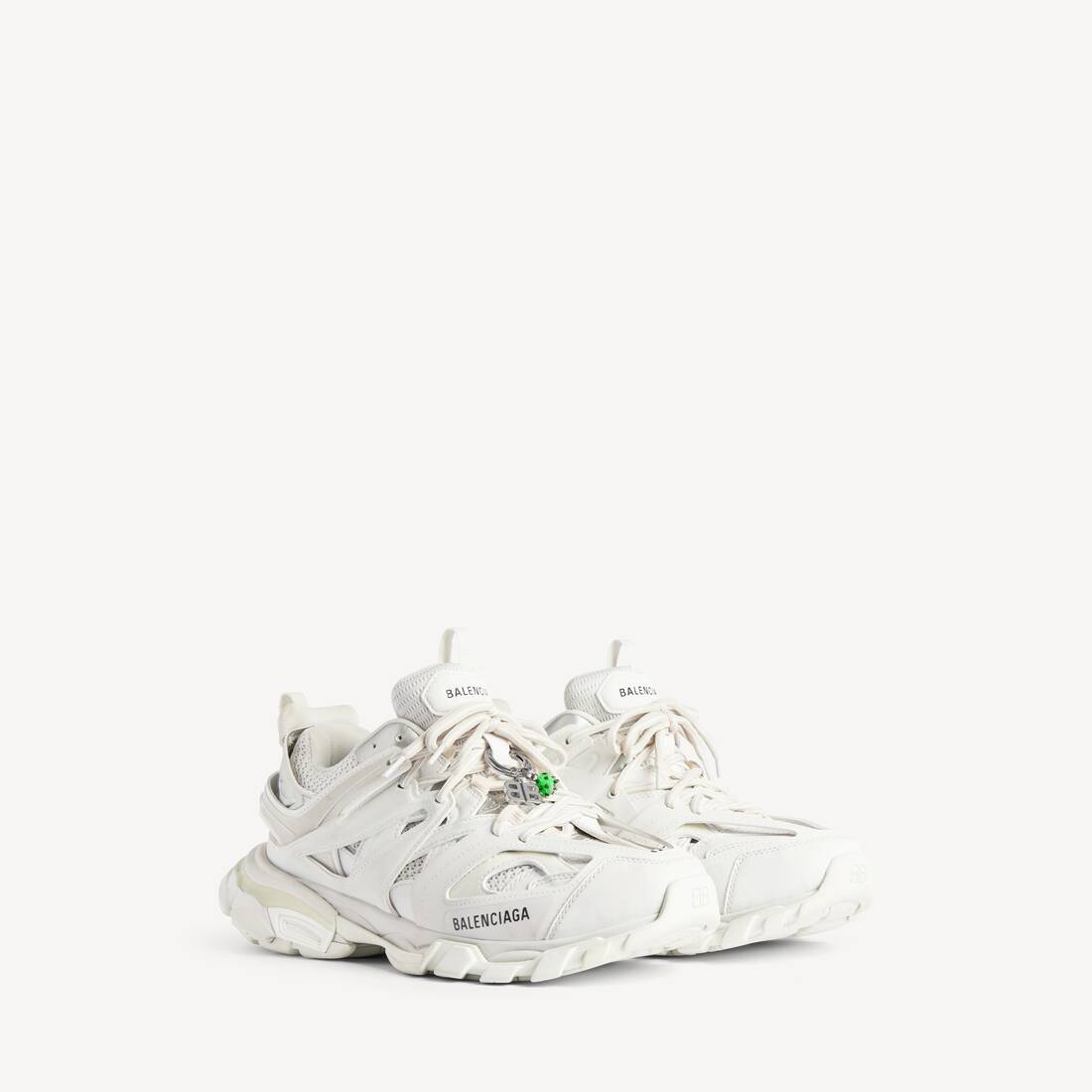 Herrarnas spårsneaker med charm i vitt