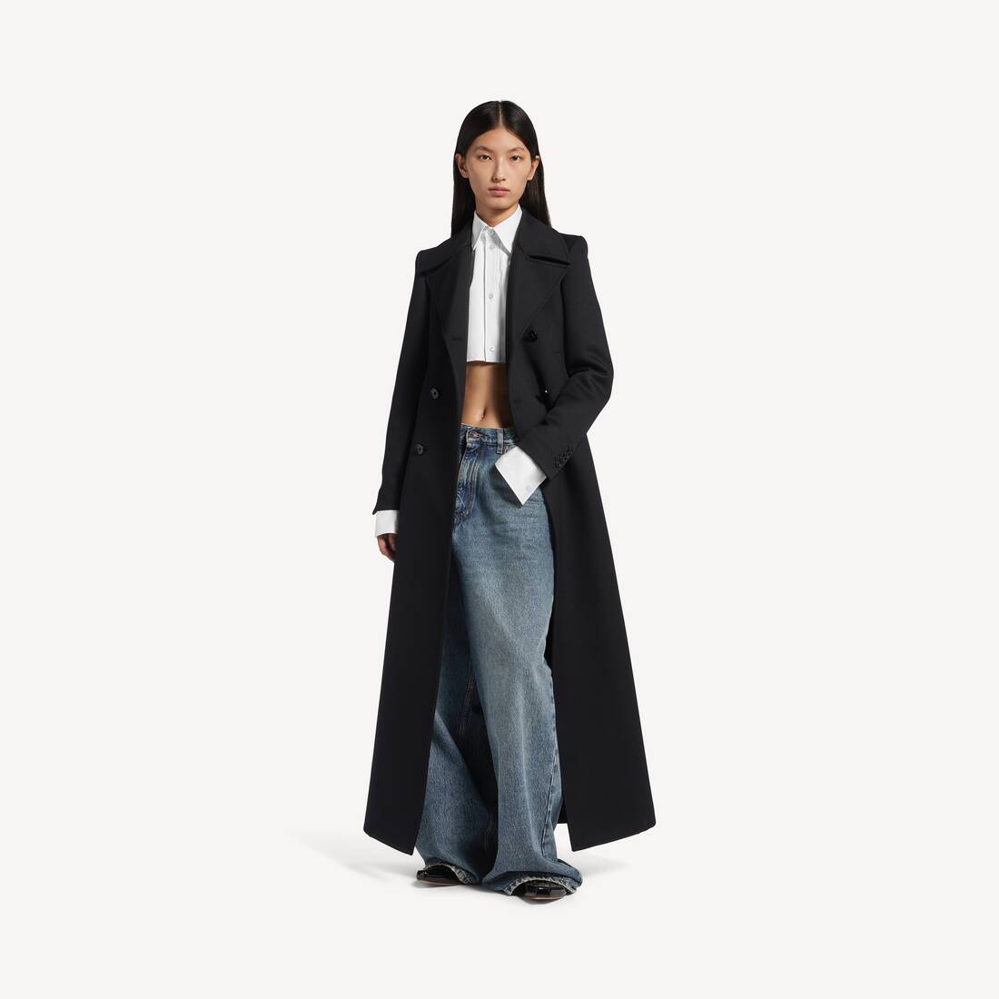 Damers låg crotch släppande jeans i smutsigt vintageblått