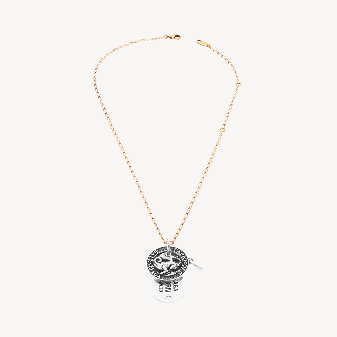 Horoskop-Kapricorn-halsband i guld/silver